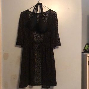 A bikini top and a bathing suit robe.